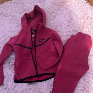 Children’s pink Nike tech suit